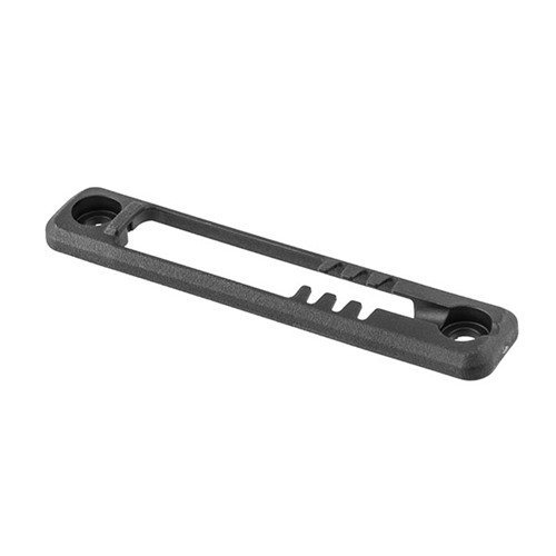 Die M-LOK Tape Switch Mounting Plate von MAGPUL bietet eine sichere und leichte Montage für Surefire ST Druckpads, mit einem snagfreien Design und hoher Robustheit.